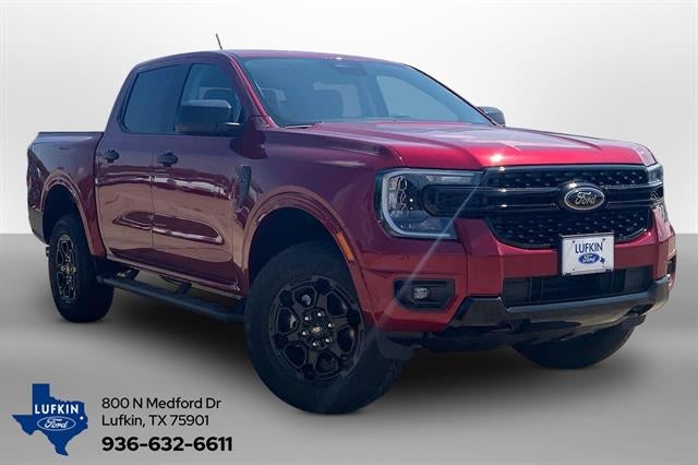2026 Ford Ranger XLT in Ruby Red Metallic Tinted Clearcoat — front three-quarter view