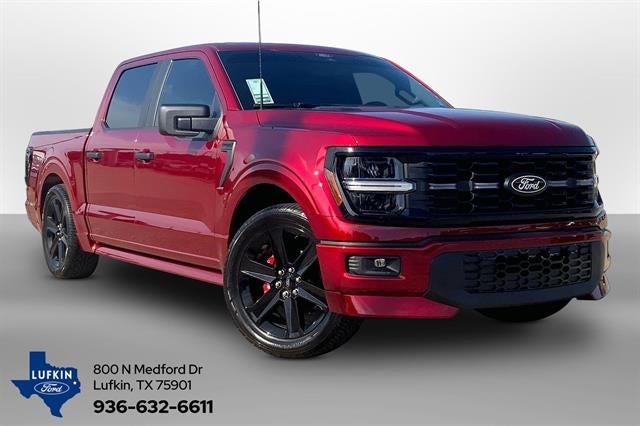 2026 Ford F-150 STX in Ruby Red Metallic Tinted Clearcoat — front three-quarter view