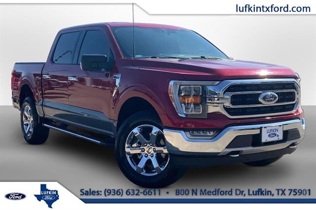 2021 Ford F-150 XLT in Rapid Red Metallic Tinted Clearcoat — front three-quarter view