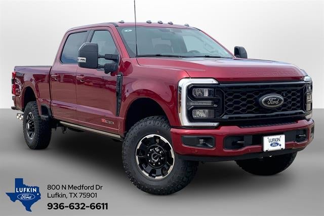 2026 Ford Super Duty F-250 Lariat in Ruby Red Metallic Tinted Clearcoat — front three-quarter view